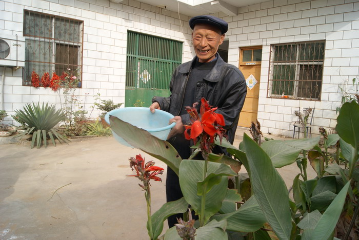 朱金喜：造福乡梓慰民心