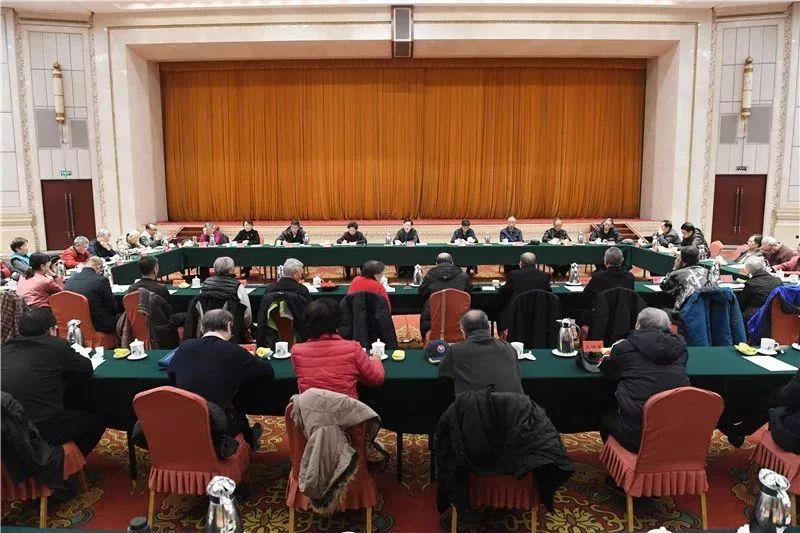 中央统战部举行离退休同志纪念改革开放40周年座谈会